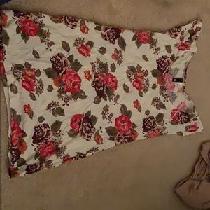 White flutter sleeved blouse.